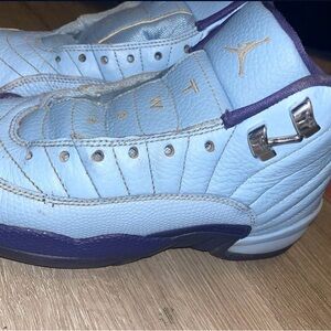 Nike Air Jordan 12 Retro GS in the 'Hornets' colorway.